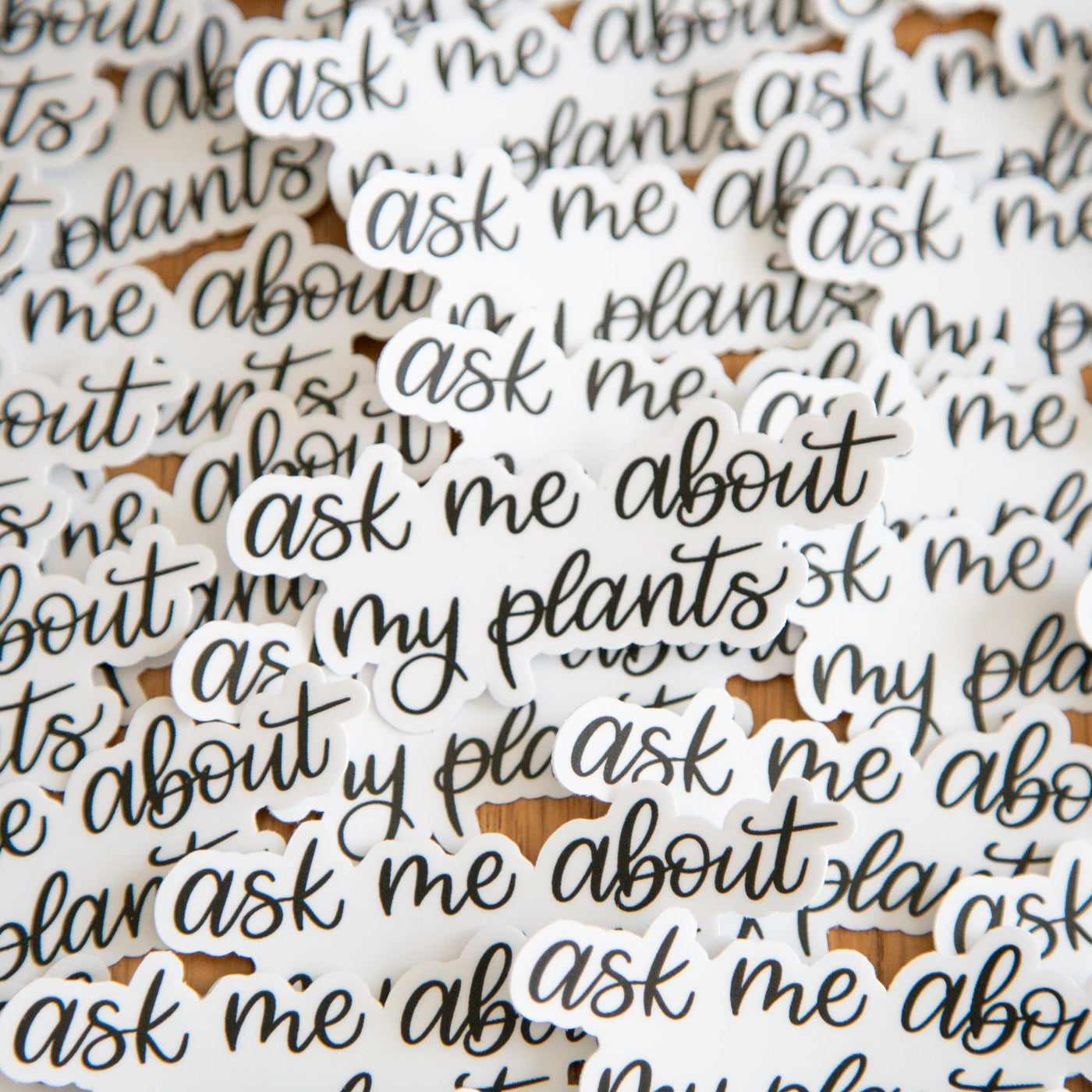 Text stickers with 'ask me about my plants' on a white background