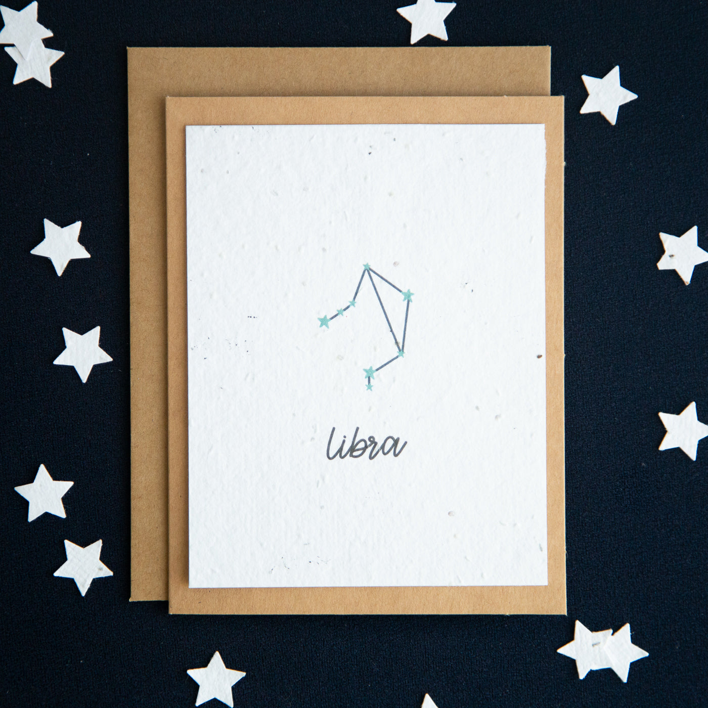 A greeting card with the Libra constellation and word “Libra” printed on plantable seed paper