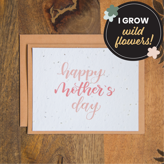 A greeting card with pink Happy Mother’s Day text printed on seed paper