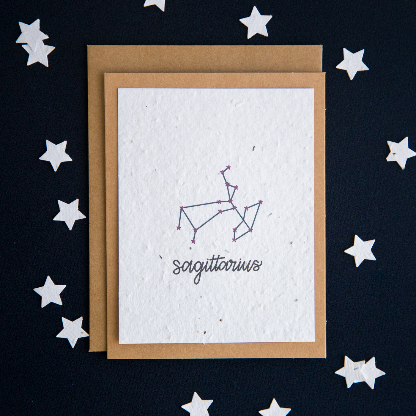 A greeting card with the Sagittarius constellation and word “Sagittarius” printed on plantable seed paper