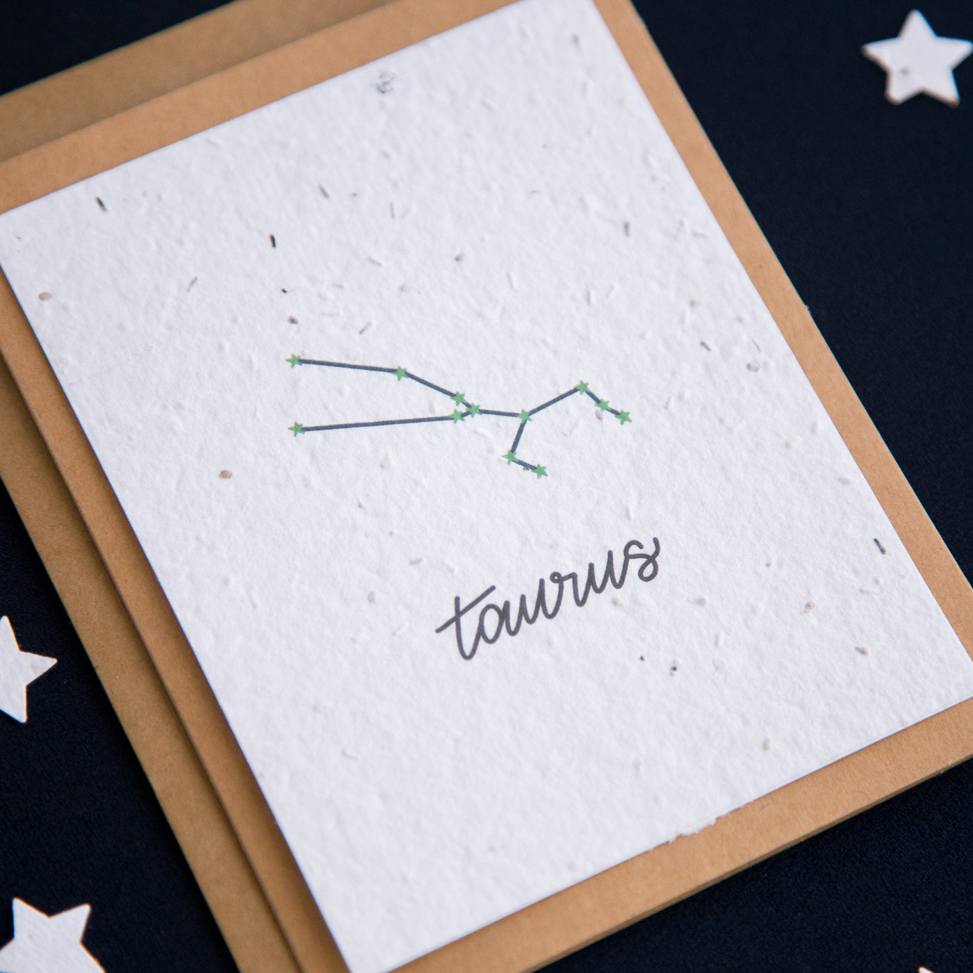 A greeting card with the Taurus constellation and word “Taurus” printed on plantable seed paper