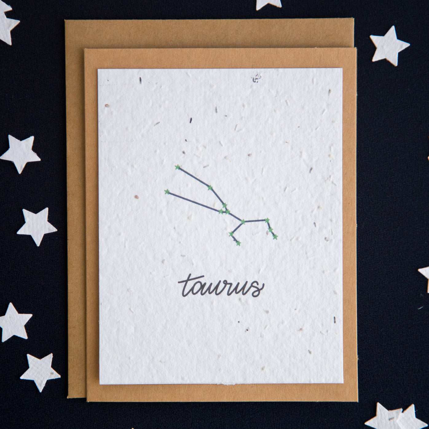 A greeting card with the Taurus constellation and word “Taurus” printed on plantable seed paper