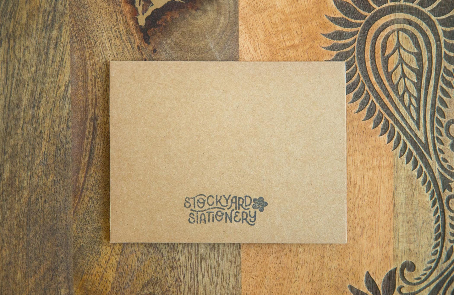 Back of a greeting card with the logo Stockyard Stationery stamped on