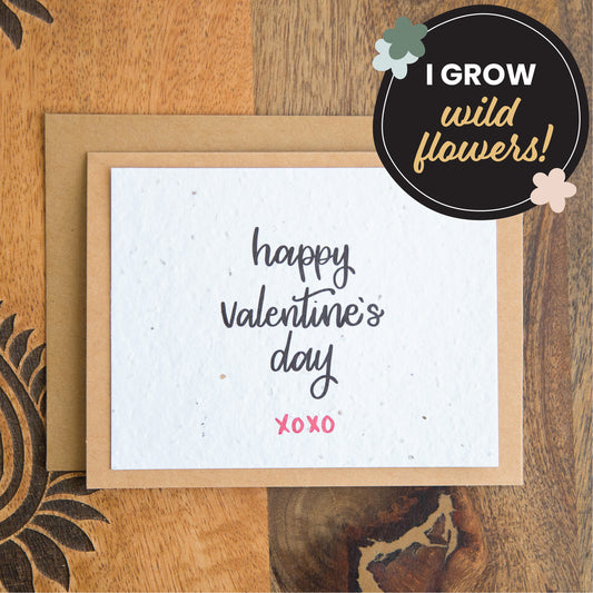 plantable greeting card with the words happy valetine's day xoxo printed in black ink on white paper